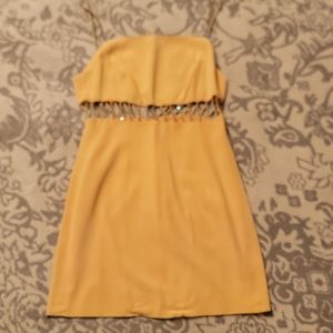 Designer Canary Yellow formal dress, with the midriff open.